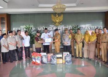 Baznas dan Pemkab Dharmasraya Serahkan Bantuan Kepada Korban Bencana Banjir Dan Longsor Pessel