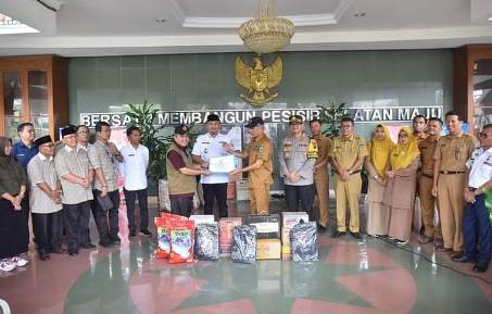 Baznas dan Pemkab Dharmasraya Serahkan Bantuan Kepada Korban Bencana Banjir Dan Longsor Pessel
